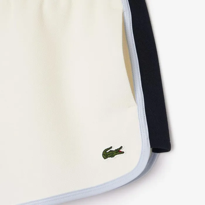Shorts and Skirts Women Lacoste Women039s Contrast Seam Piqu Shorts White Navy Blue Light Blue It4