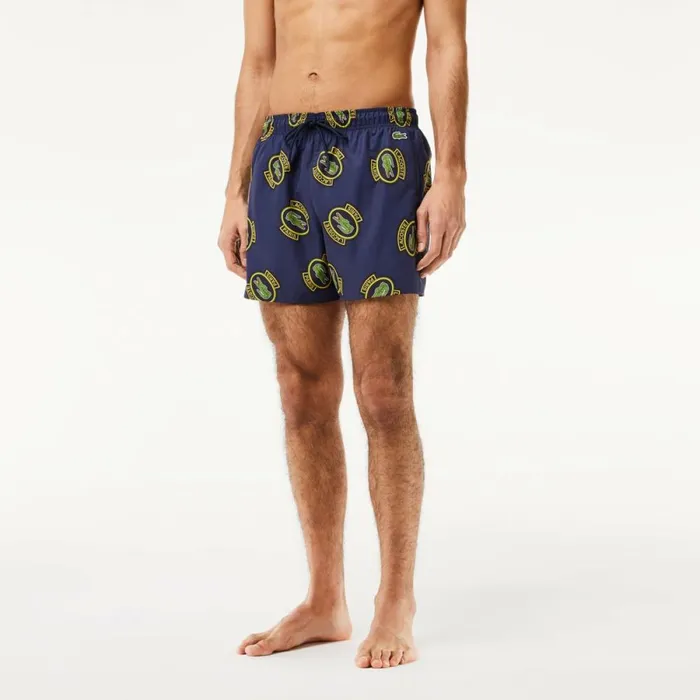 Shorts and Swim Men Lacoste Men039s Logo Badge Swim Trunks Navy Blue Yellow Z57