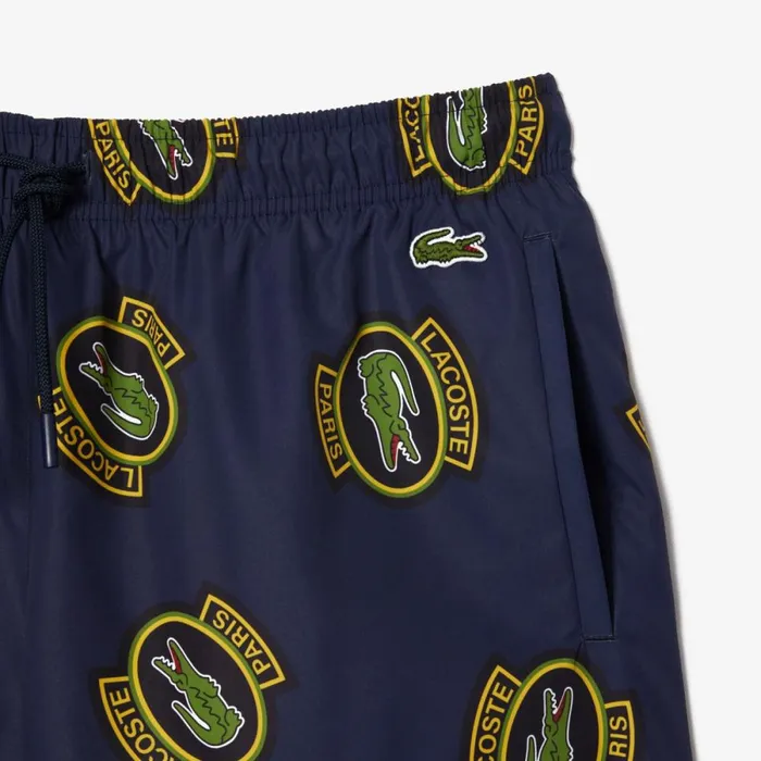 Shorts and Swim Men Lacoste Men039s Logo Badge Swim Trunks Navy Blue Yellow Z57
