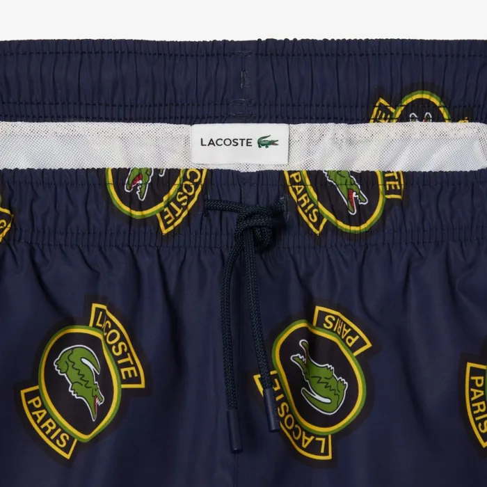 Shorts and Swim Men Lacoste Men039s Logo Badge Swim Trunks Navy Blue Yellow Z57