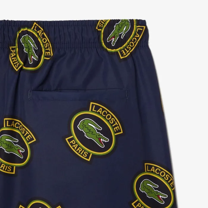 Shorts and Swim Men Lacoste Men039s Logo Badge Swim Trunks Navy Blue Yellow Z57