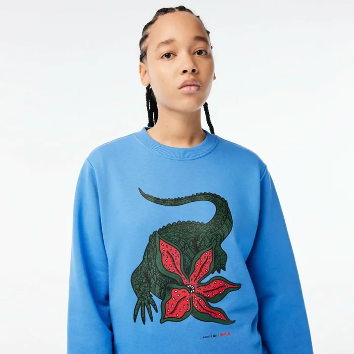 Sweaters and Sweatshirts Women Lacoste Womens Lacoste X Netflix Loose Fit Organic Cotton Fleece Sweatshirt Ethereal Blue L99