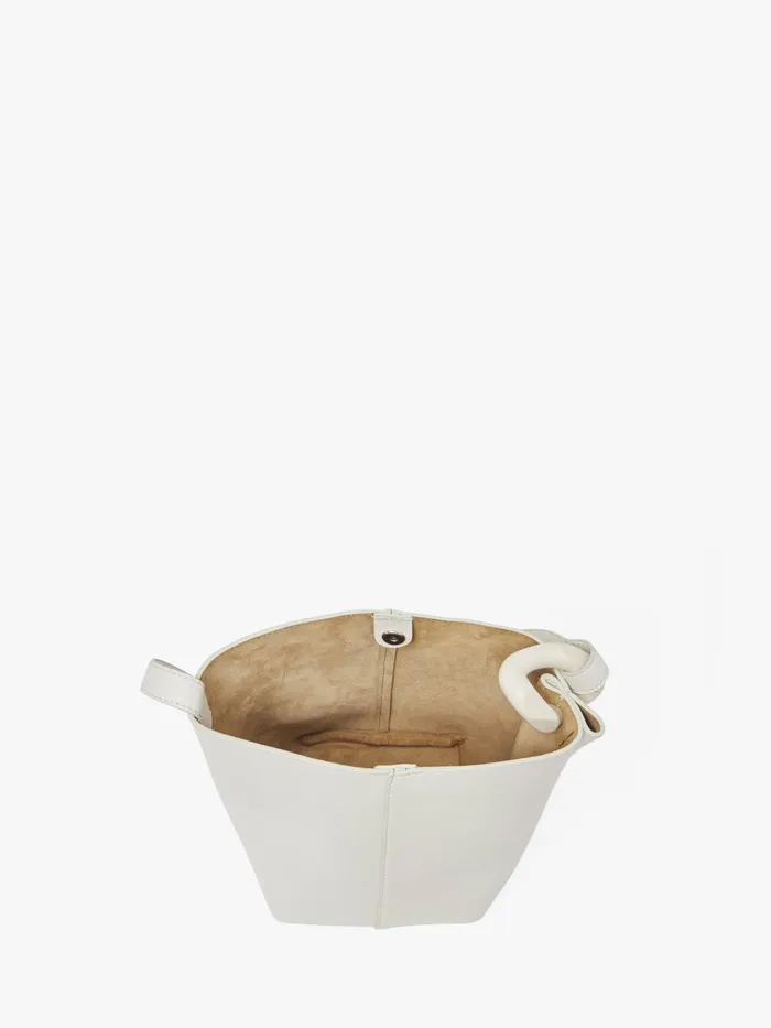 WomenMen Corner Bag JW Anderson SMALL JWA CORNER BUCKET 8211 LEATHER BUCKET BAG Off White WomenMen Corner Bag JW Anderson SMALL JWA CORNER BUCKET 8211 LEATHER BUCKET BAG Off White
