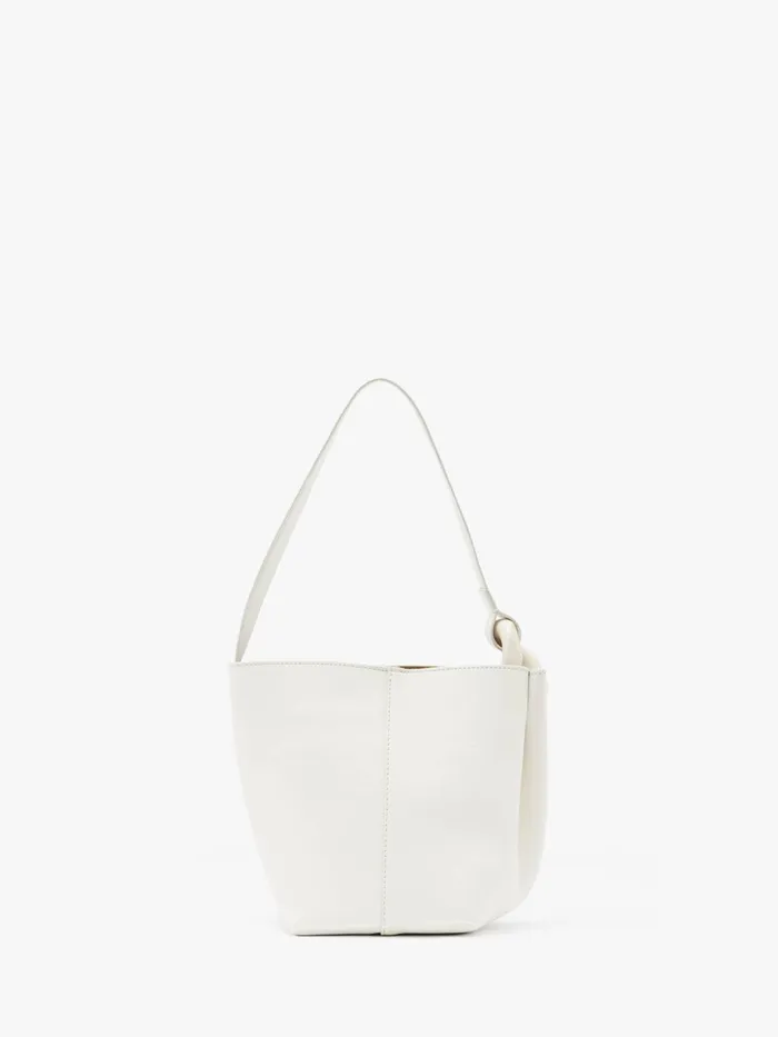 WomenMen Corner Bag JW Anderson SMALL JWA CORNER BUCKET 8211 LEATHER BUCKET BAG Off White WomenMen Corner Bag JW Anderson SMALL JWA CORNER BUCKET 8211 LEATHER BUCKET BAG Off White