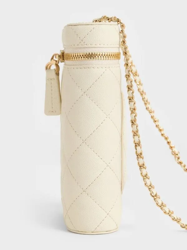Women Mini Apfra Quilted Elongated Bag 8211 Cream CHARLES and KEITH Crossbody Bags
