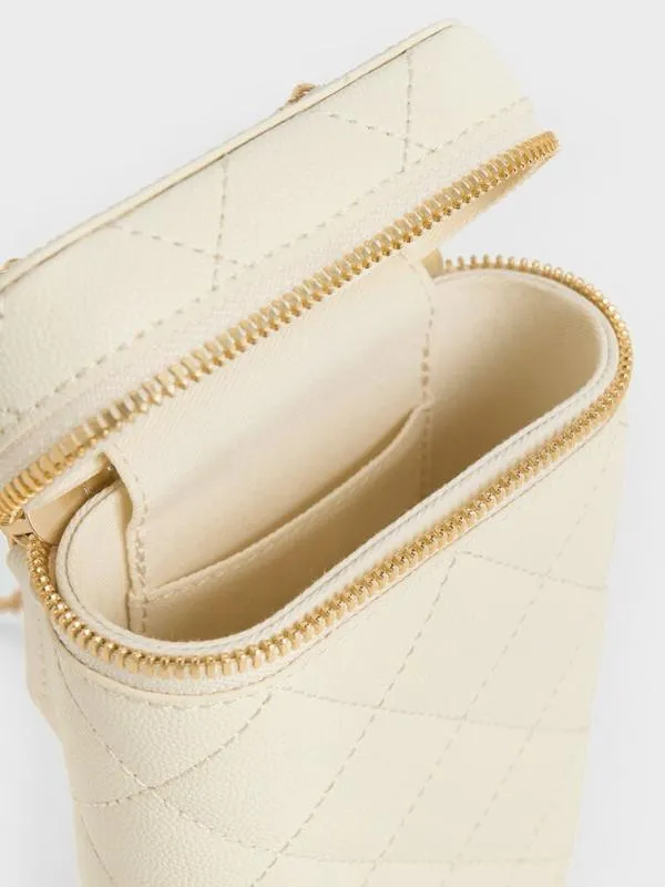 Women Mini Apfra Quilted Elongated Bag 8211 Cream CHARLES and KEITH Crossbody Bags